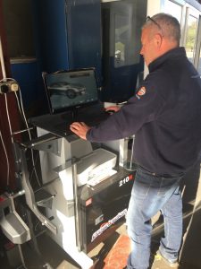 Mechanic using a computer